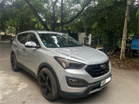 Sleek Silver Hyundai Santa Fe 2WD AT