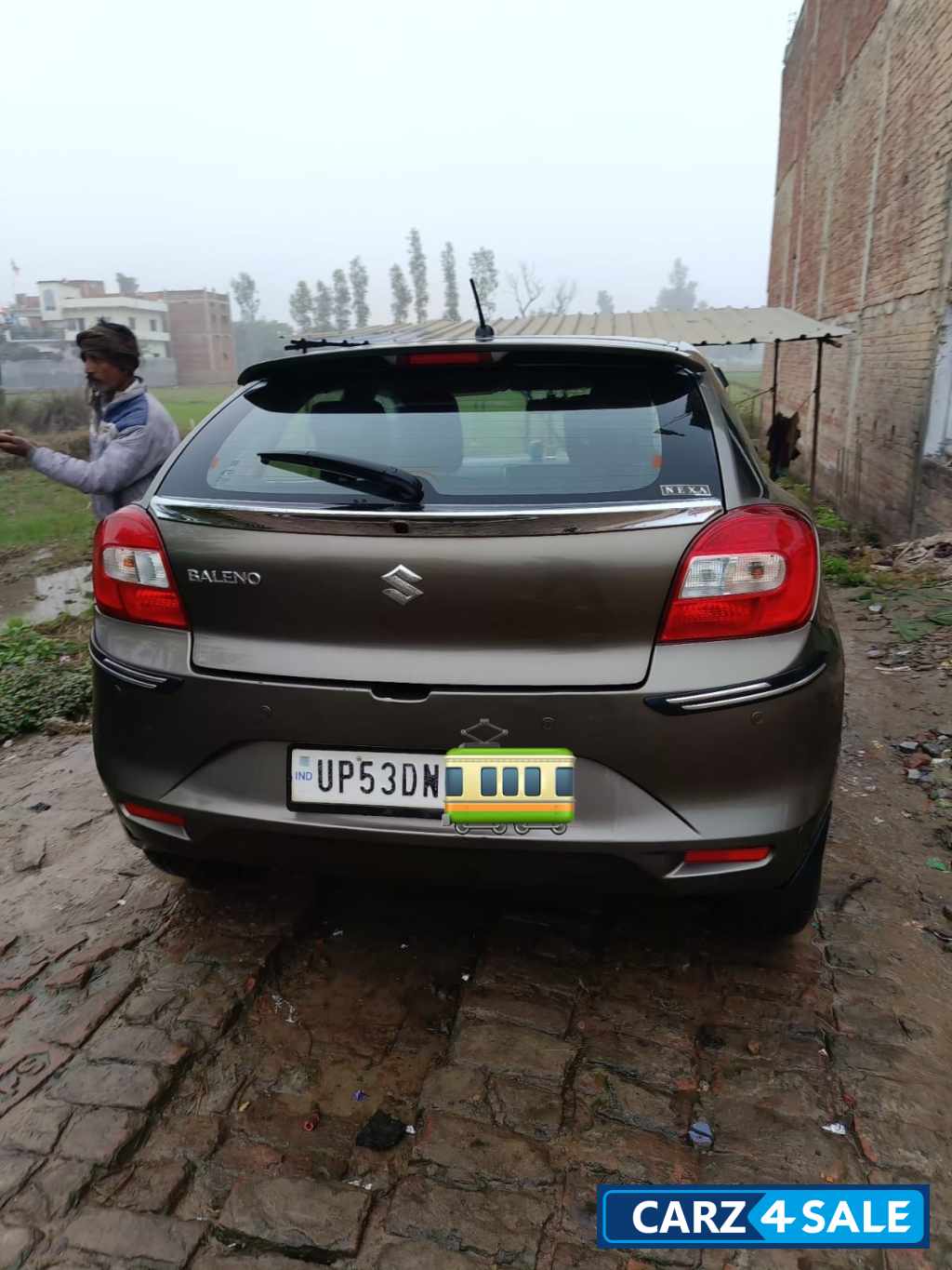 Grey Maruti Suzuki Baleno Delta