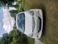 White Hyundai Eon Megna +