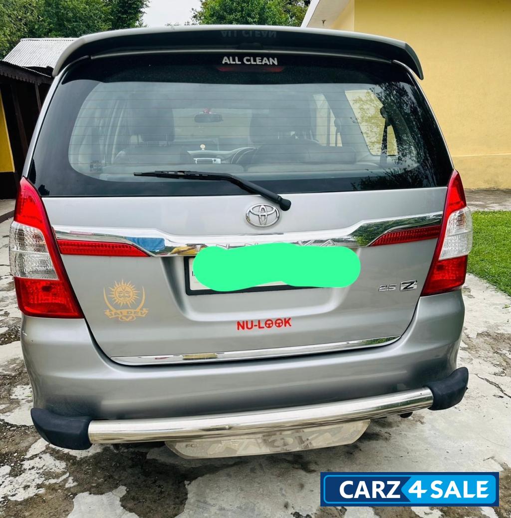 Silver Toyota Innova ZX