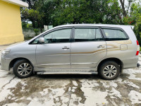 Silver Toyota Innova ZX