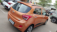 Orange Hyundai i10 Sportz