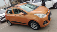 Orange Hyundai i10 Sportz