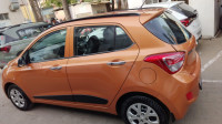 Orange Hyundai i10 Sportz