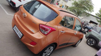 Orange Hyundai i10 Sportz