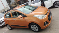 Orange Hyundai i10 Sportz