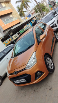 Orange Hyundai i10 Sportz