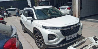 White Maruti Suzuki Fronx Delta