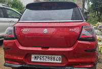 Sizzling Red Maruti Suzuki Swift vxi