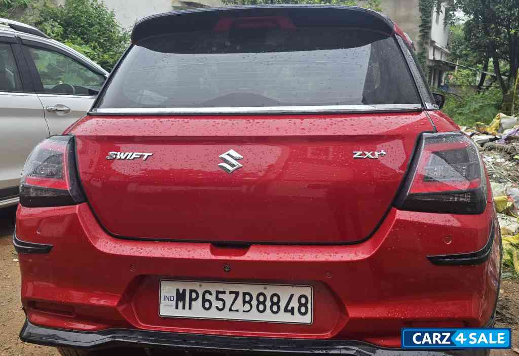 Sizzling Red Maruti Suzuki Swift vxi