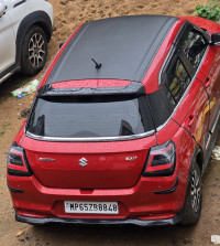Sizzling Red Maruti Suzuki Swift vxi