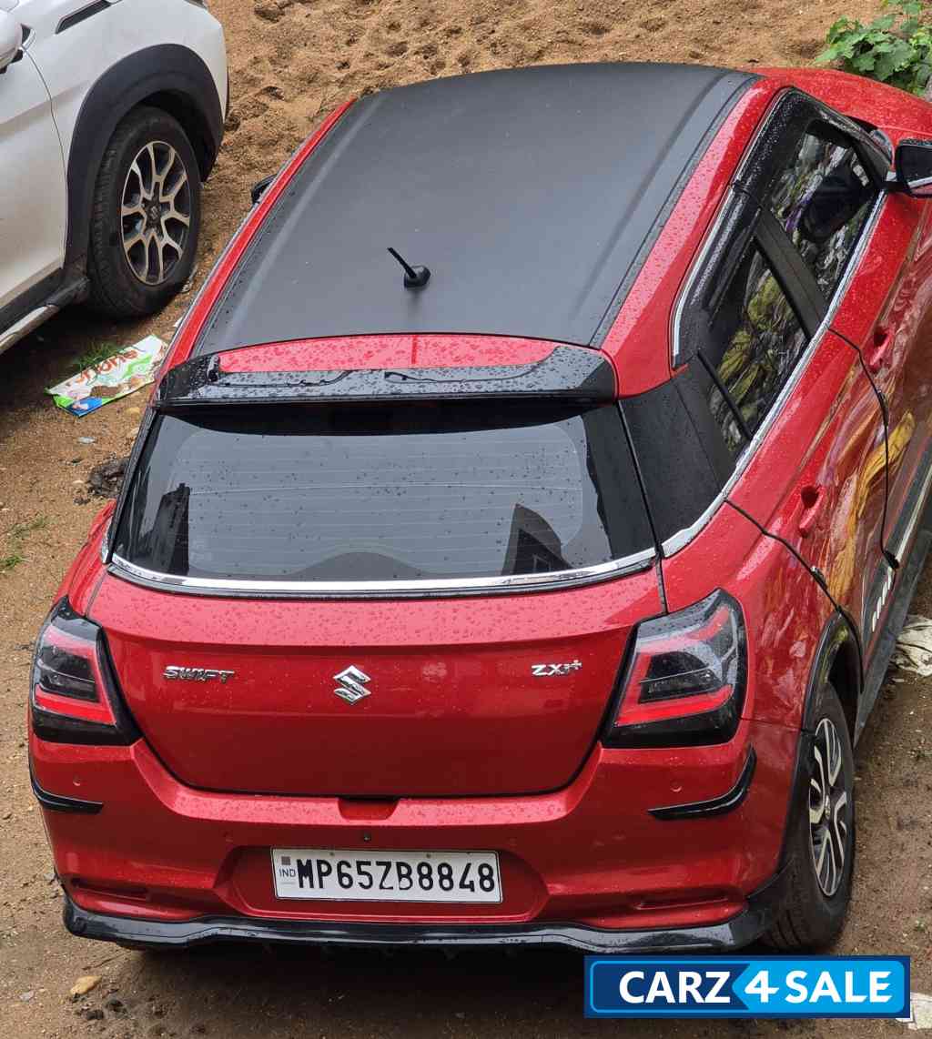 Sizzling Red Maruti Suzuki Swift vxi