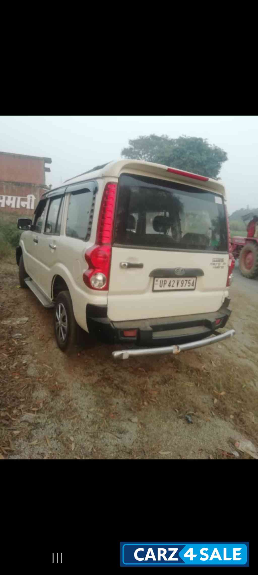 White Mahindra Scorpio Ex bs4