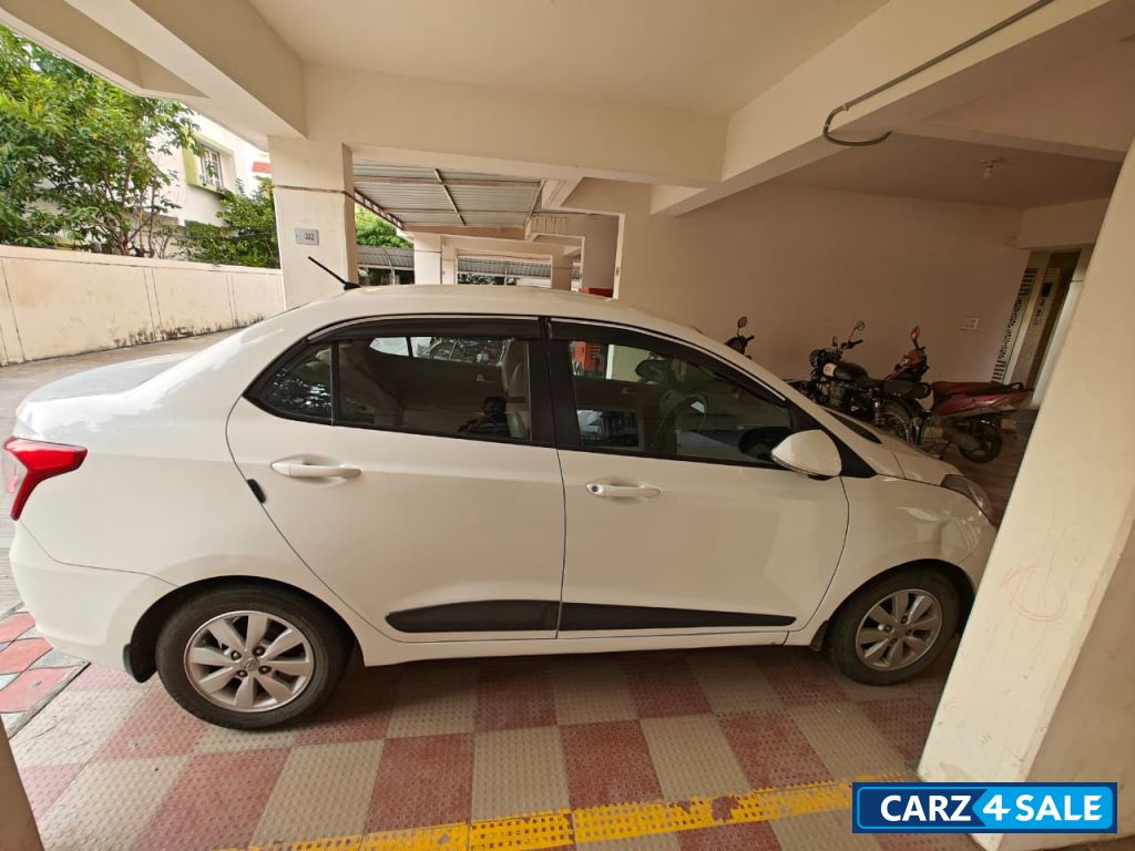 Pure White Hyundai Xcent SX 1.1 CRDI