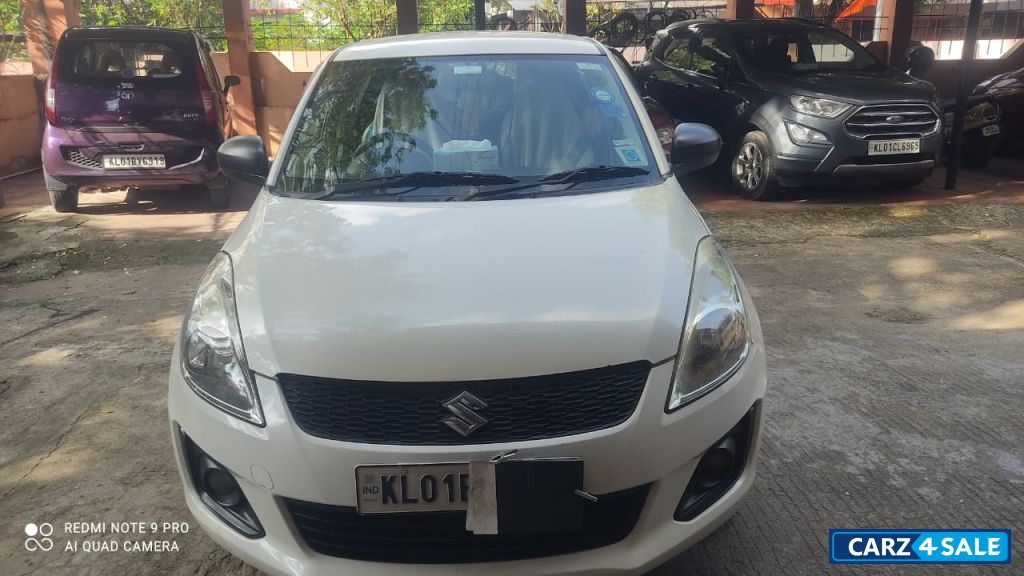 Maruti Suzuki Swift LXiO 2016 December