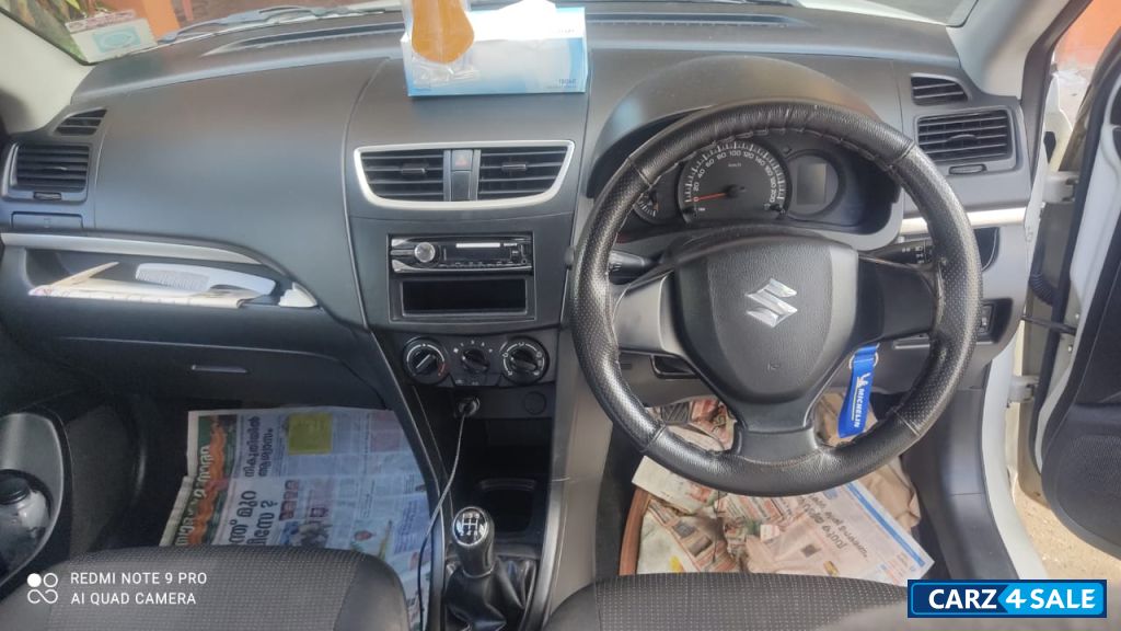 Maruti Suzuki Swift LXiO 2016 December