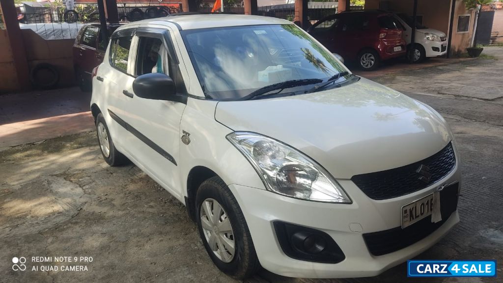 Maruti Suzuki Swift LXiO 2016 December