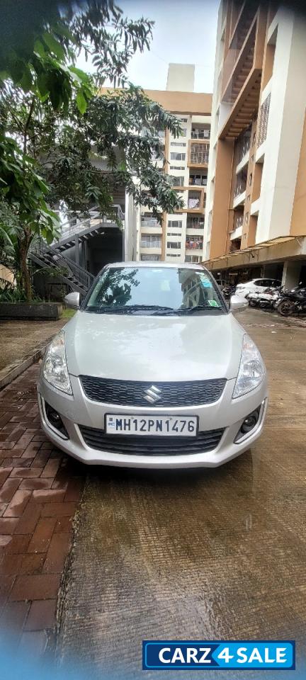 Silver Maruti Suzuki Swift VXI