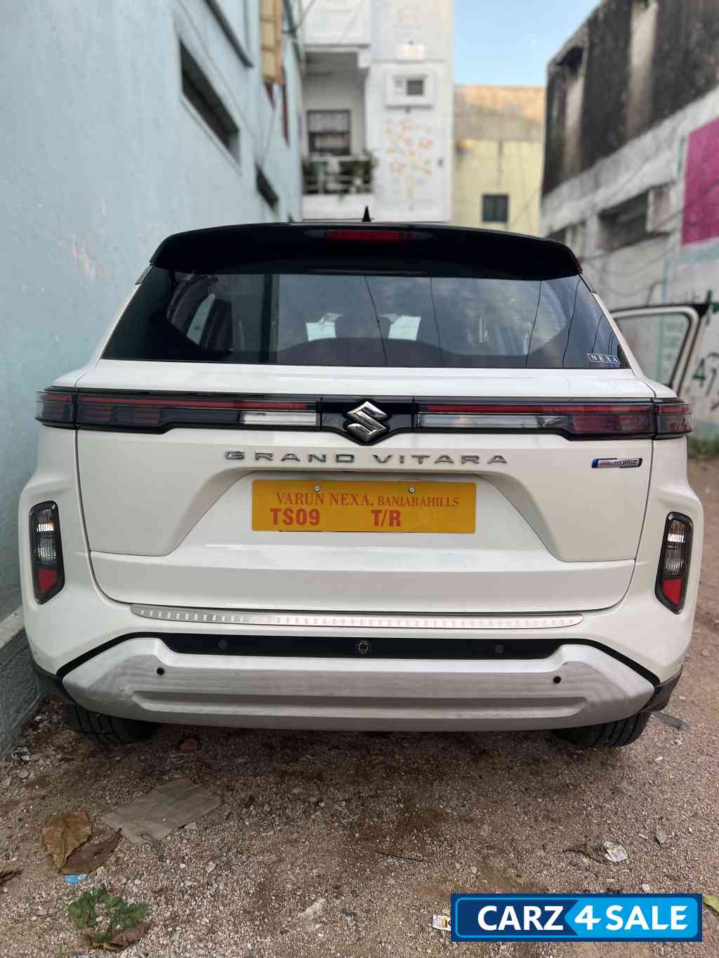 White Maruti Suzuki Grand Vitara smart hybrid