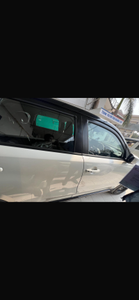 White Maruti Suzuki Grand Vitara smart hybrid