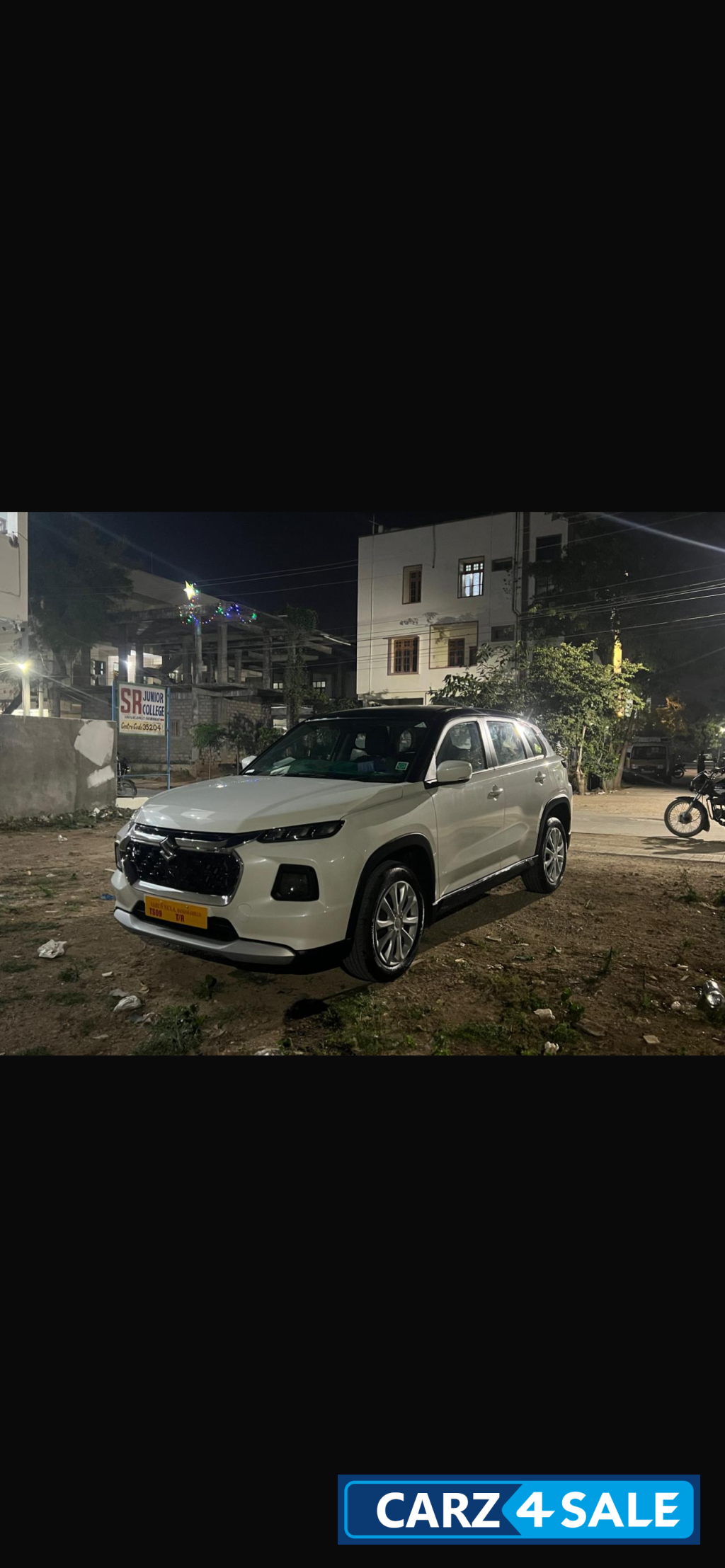 White Maruti Suzuki Grand Vitara smart hybrid
