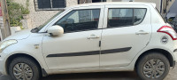 White Maruti Suzuki Swift LXI (O)