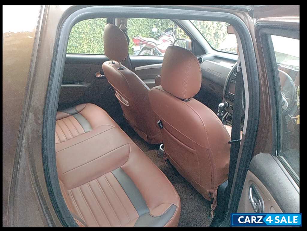 Woodland. Brown Renault Duster 110 RxZ Diesel