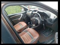 Woodland. Brown Renault Duster 110 RxZ Diesel