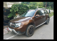 Woodland. Brown Renault Duster 110 RxZ Diesel