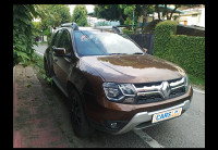 Woodland. Brown Renault Duster 110 RxZ Diesel