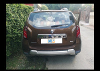 Woodland. Brown Renault Duster 110 RxZ Diesel