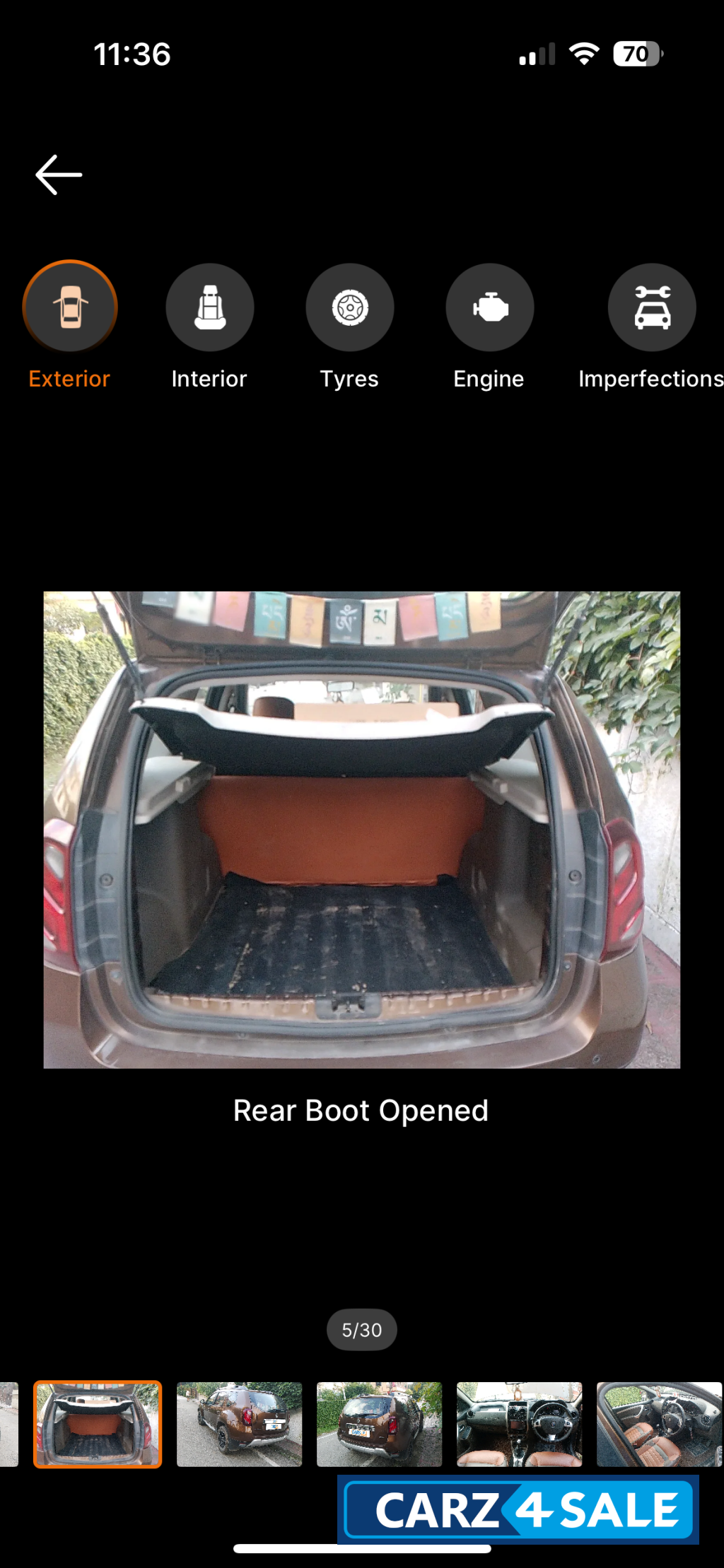 Woodland. Brown Renault Duster 110 RxZ Diesel