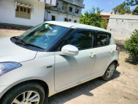 White Maruti Suzuki Swift Zdi