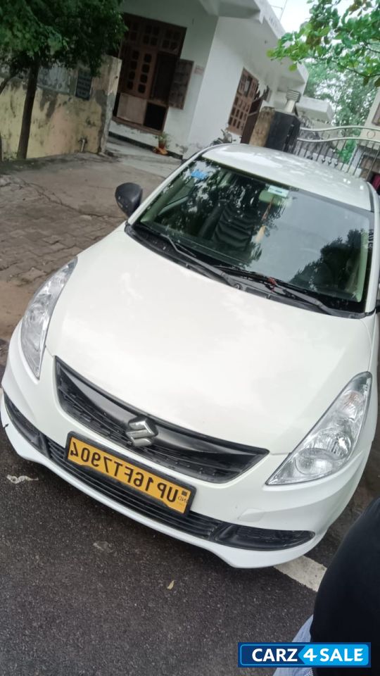White Pearl Maruti Suzuki Dzire Tour s cng