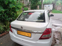 White Pearl Maruti Suzuki Dzire Tour s cng