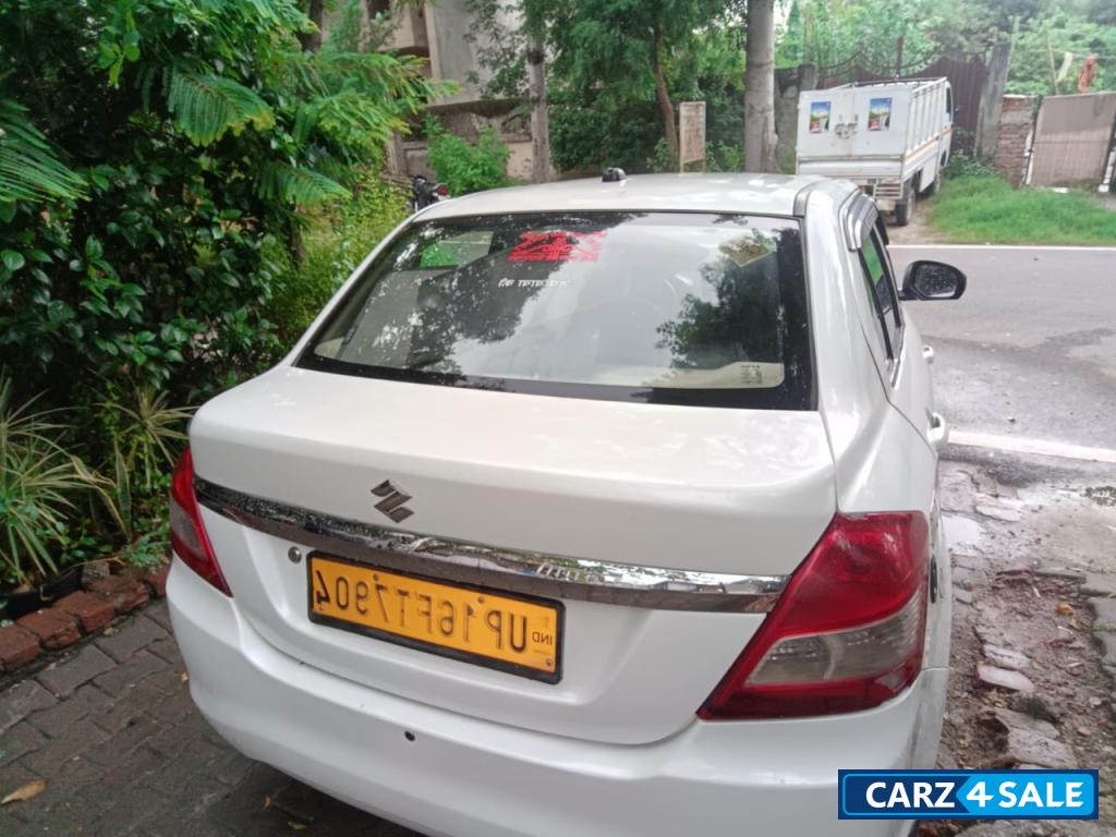 White Pearl Maruti Suzuki Dzire Tour s cng