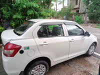 White Pearl Maruti Suzuki Dzire Tour s cng