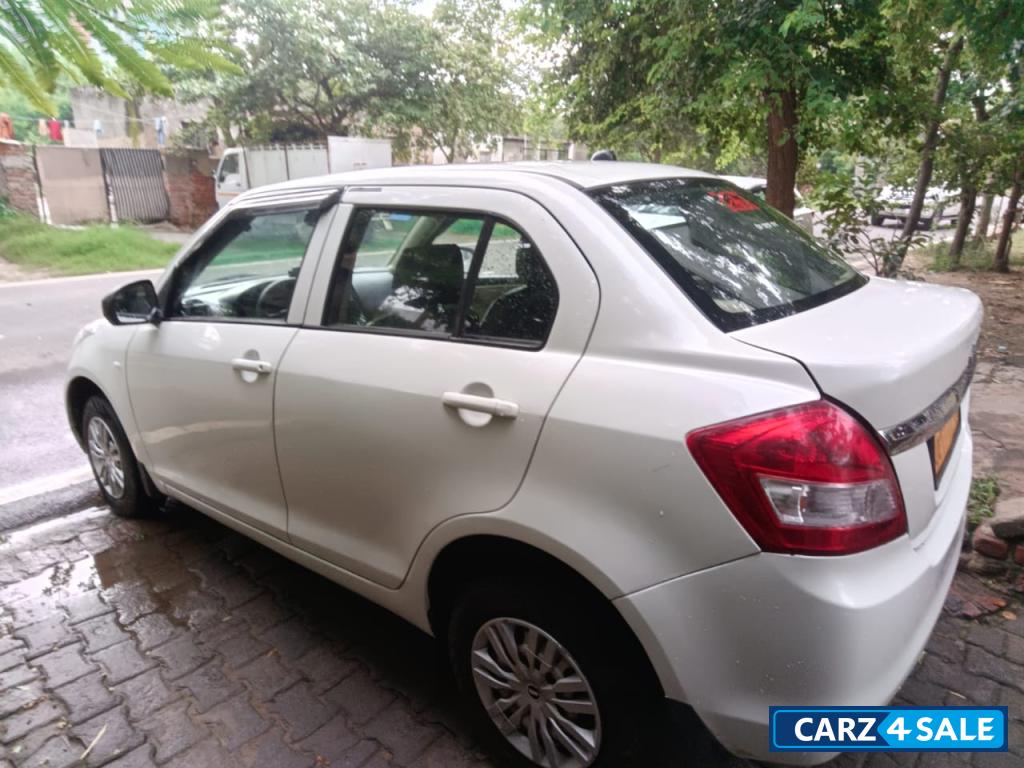White Pearl Maruti Suzuki Dzire Tour s cng
