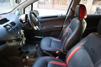 Red Chevrolet Beat LT