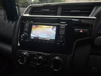 White Honda Jazz 1.2 L petrol