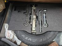 White Honda Jazz 1.2 L petrol