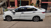 White Orchid Pearl Honda City Zx