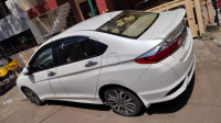 White Orchid Pearl Honda City Zx