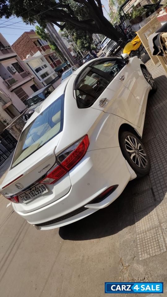 White Orchid Pearl Honda City Zx