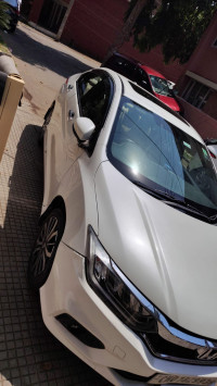 White Orchid Pearl Honda City Zx