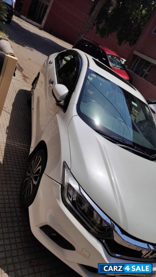 White Orchid Pearl Honda City Zx