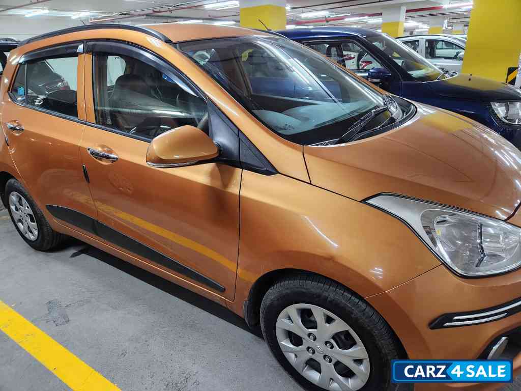 Golden Orange Hyundai  Grandi10
