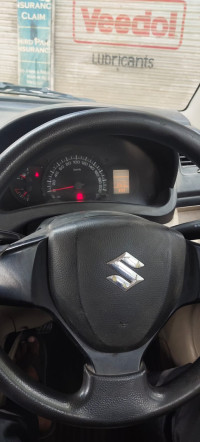 Mettakic White Maruti Suzuki Dzire Lxi