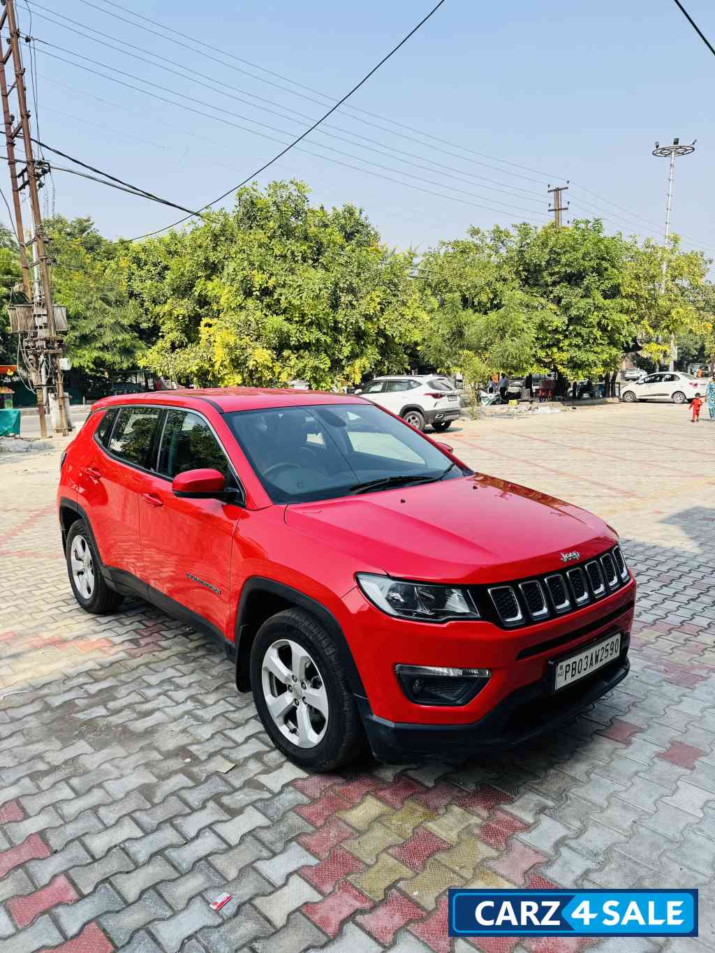 Exotic Red Jeep Compass LONGITUDE 2.0D