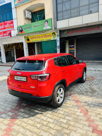 Exotic Red Jeep Compass LONGITUDE 2.0D